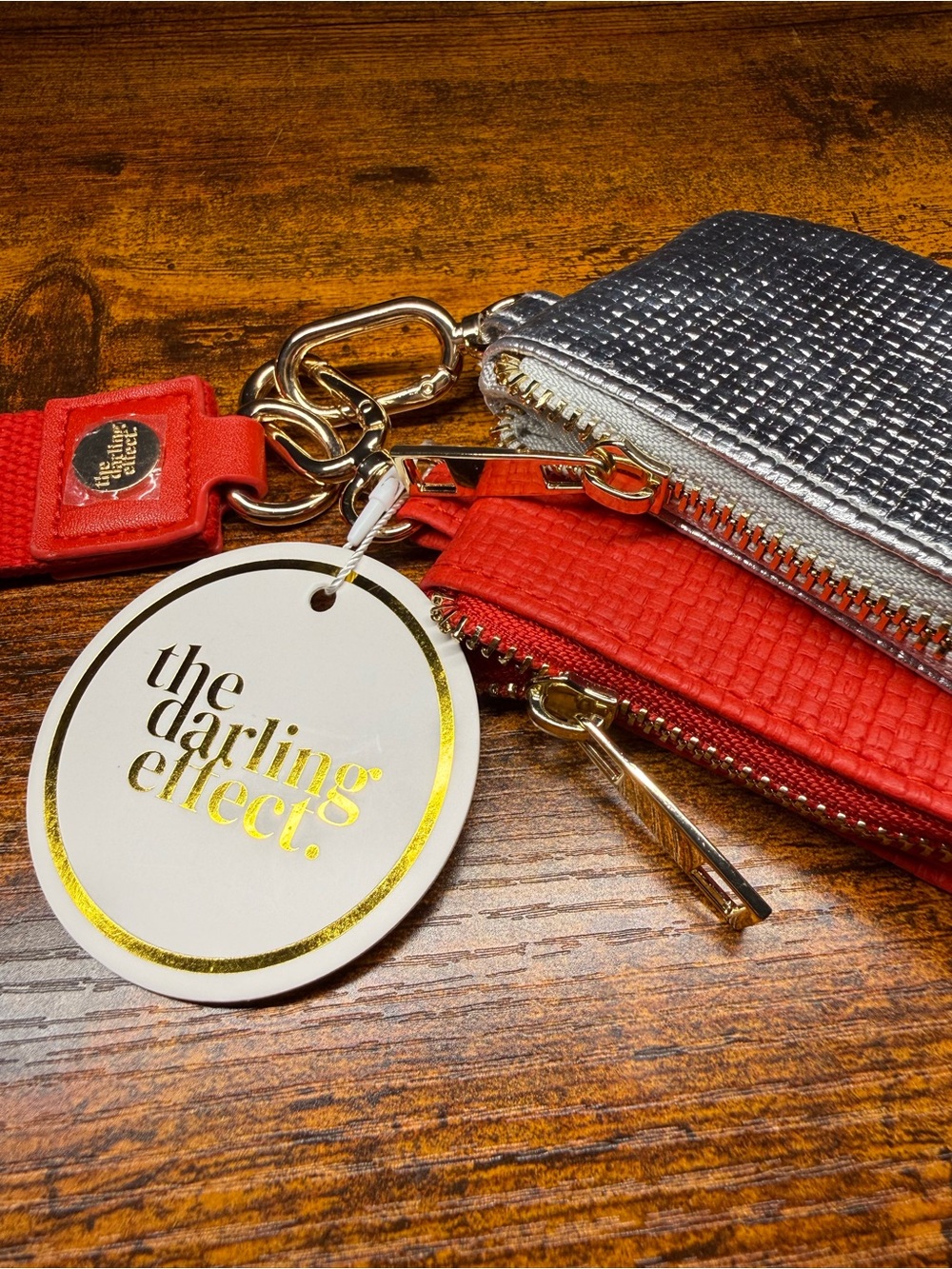 The Darling Effect Metallic Silver & Red Wristlet